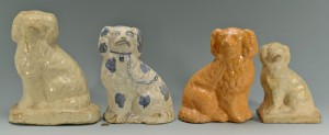 Lot 61: Grouping of 4 Sewer Tile Spaniel Dogs