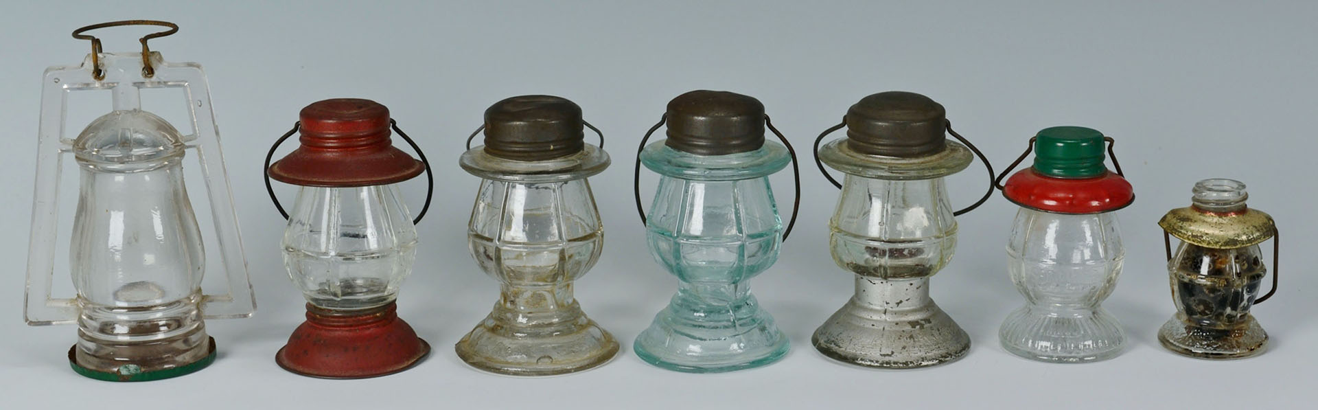 Lot 665: 12 American Glass Candy Containers