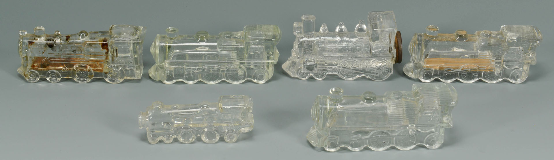 Lot 666: 32 American Glass Candy Containers