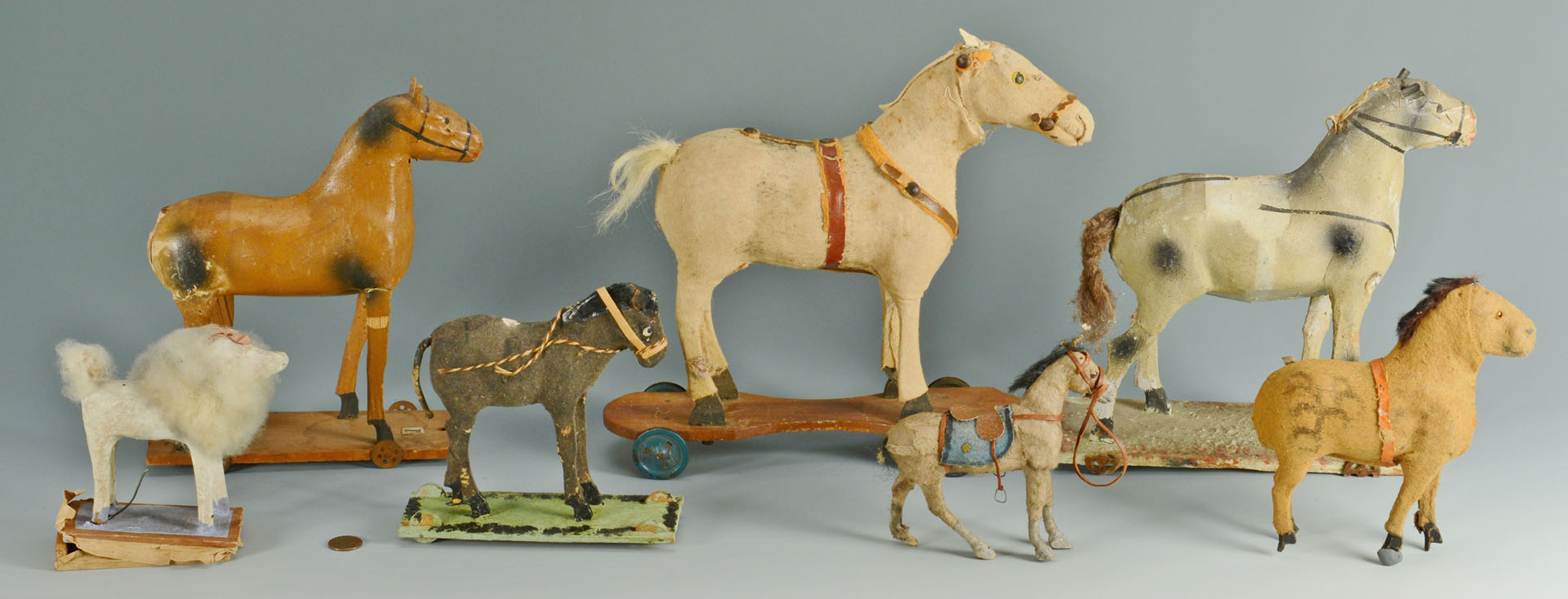 Lot 667: Group of 7 early pull toys and animals