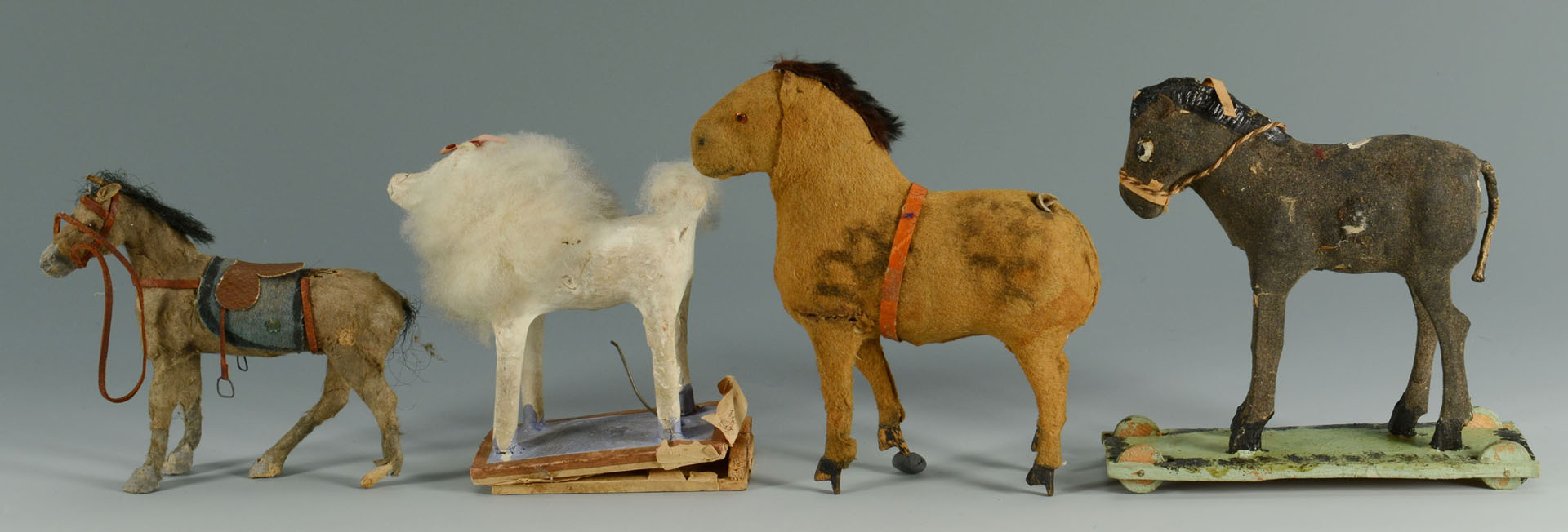 Lot 667: Group of 7 early pull toys and animals