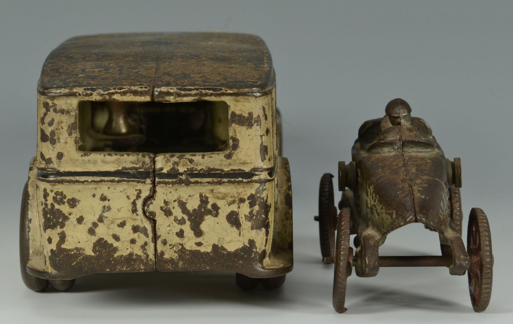 Lot 669: Two cast iron vehicles, Fageol & other