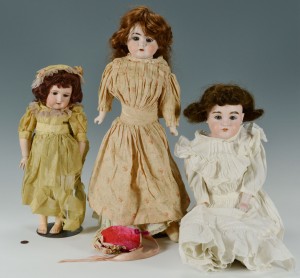 Lot 678: 3 German Bisque Head Dolls