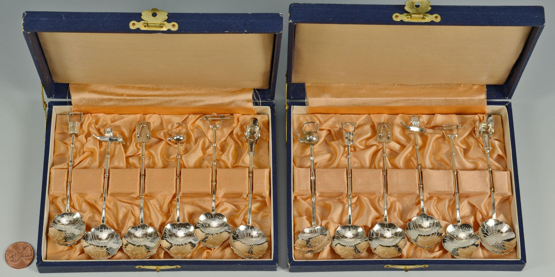 Lot 731: Set of 12 Japanese .950 Silver Novelty Spoons