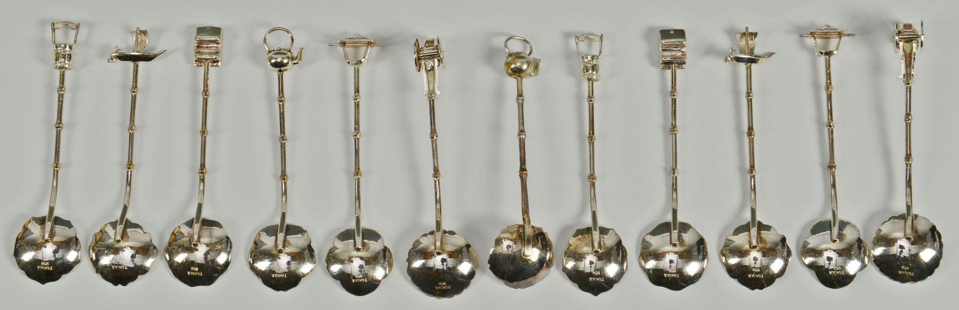 Lot 731: Set of 12 Japanese .950 Silver Novelty Spoons