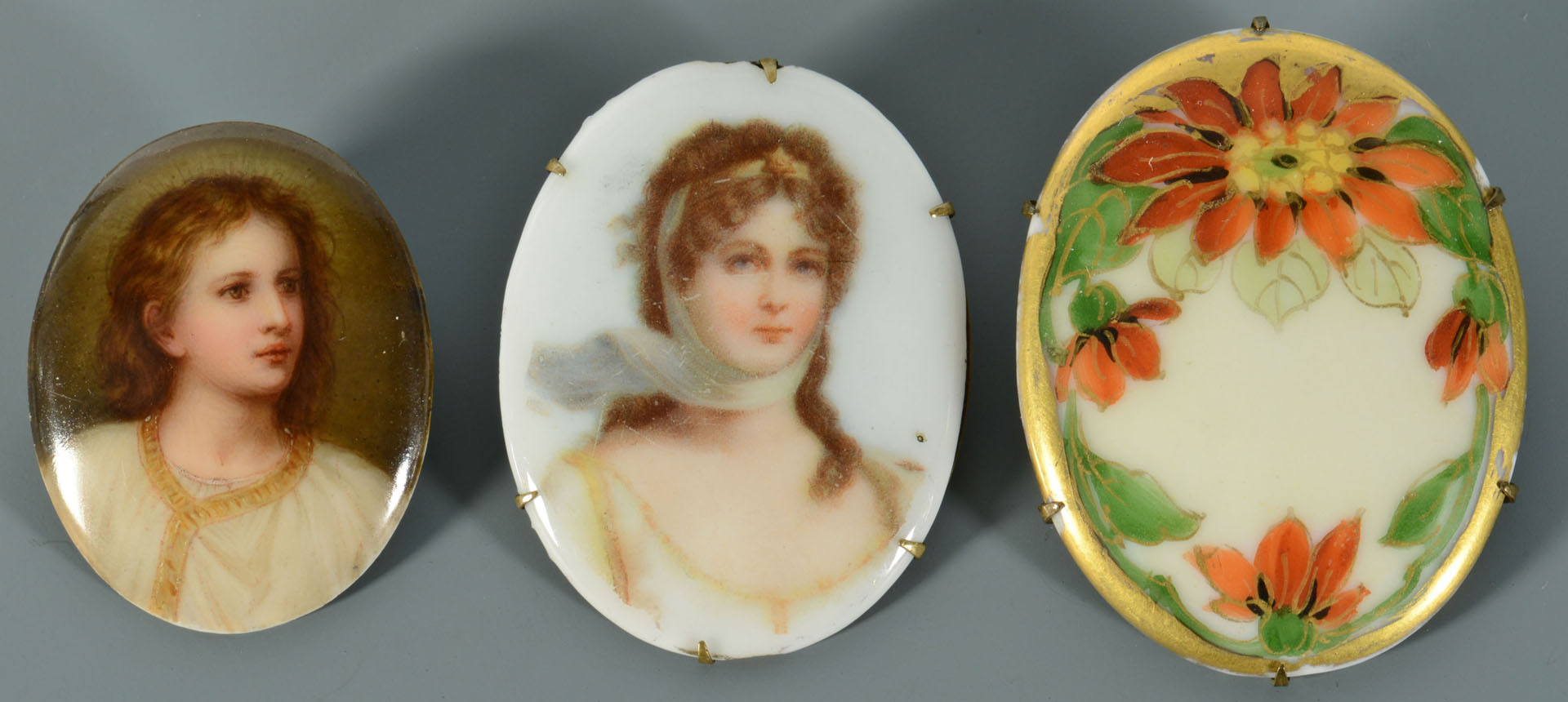 Lot 741: Three miniature paintings on porcelain inc. 2 pins