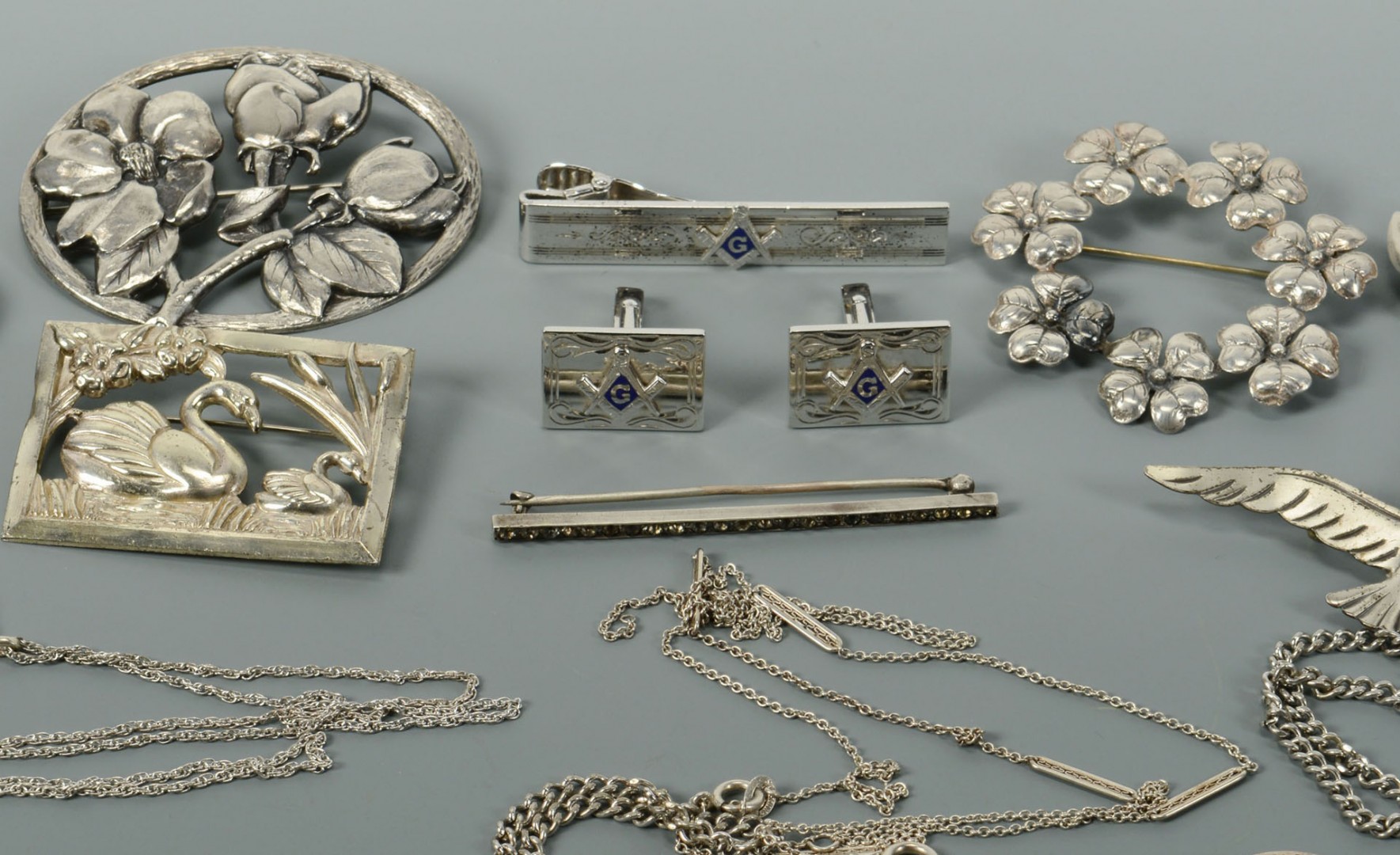 Lot 742: Lot of Silver Jewelry: Floral, Masonic, Religious