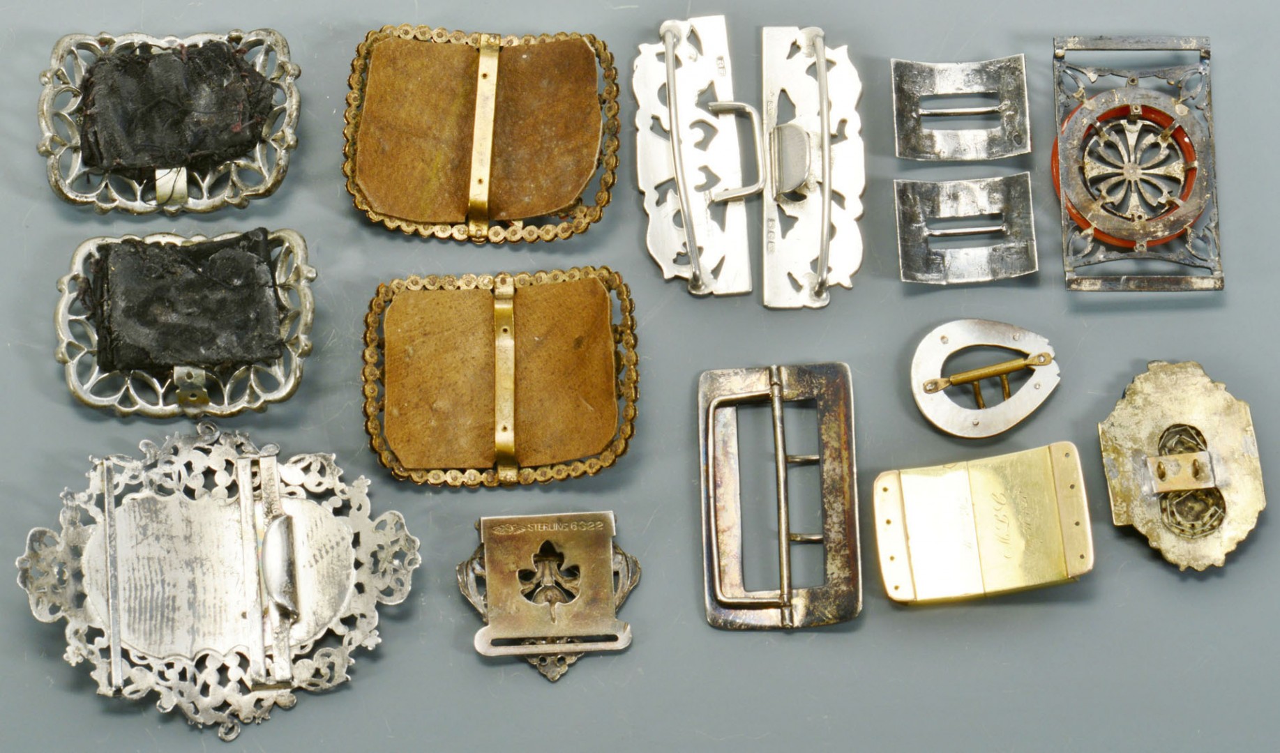 Lot 750: Vintage shoe and belt buckles, some sterling