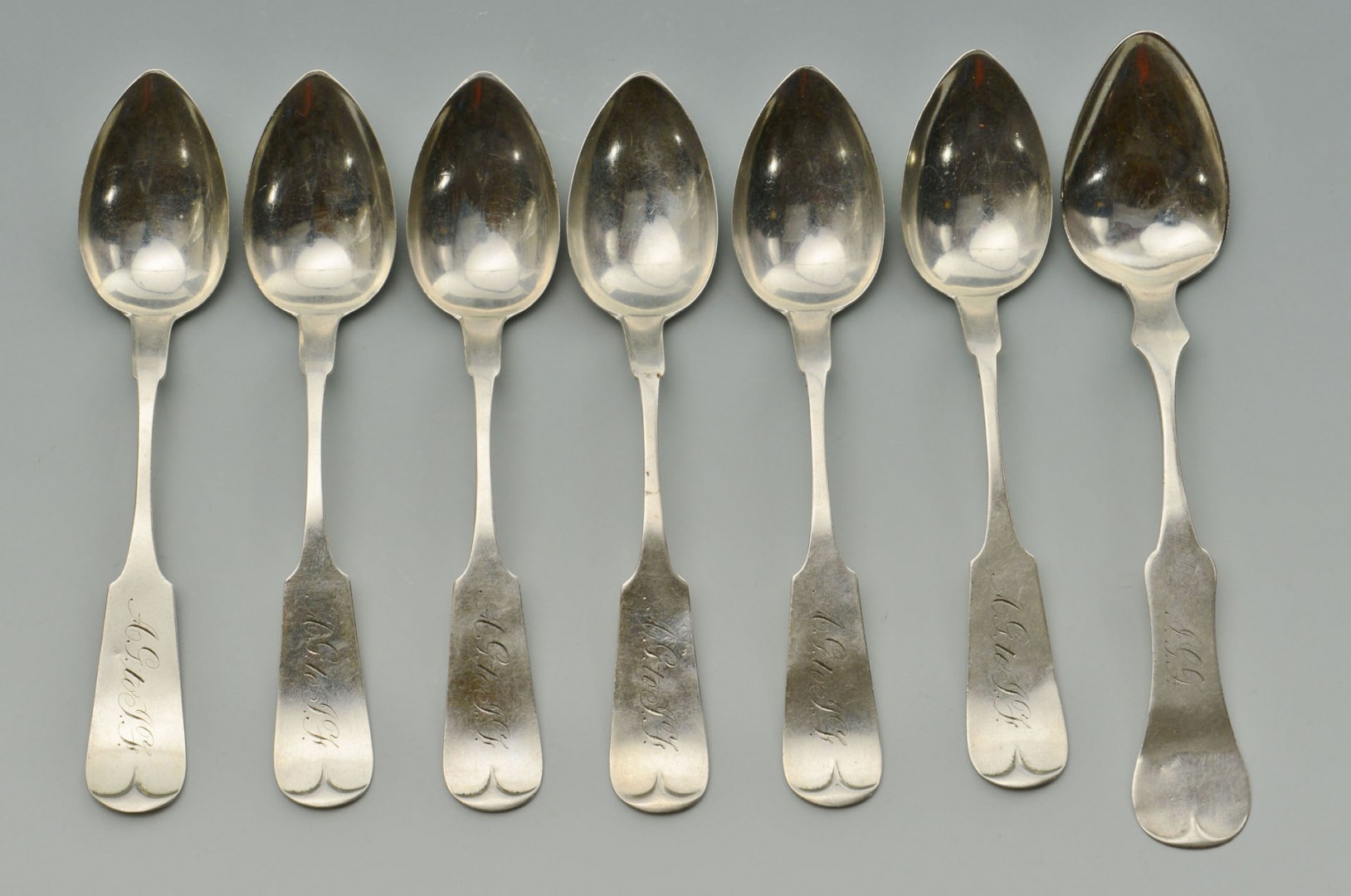 Lot 92: Seven Kentucky retailed silver spoons