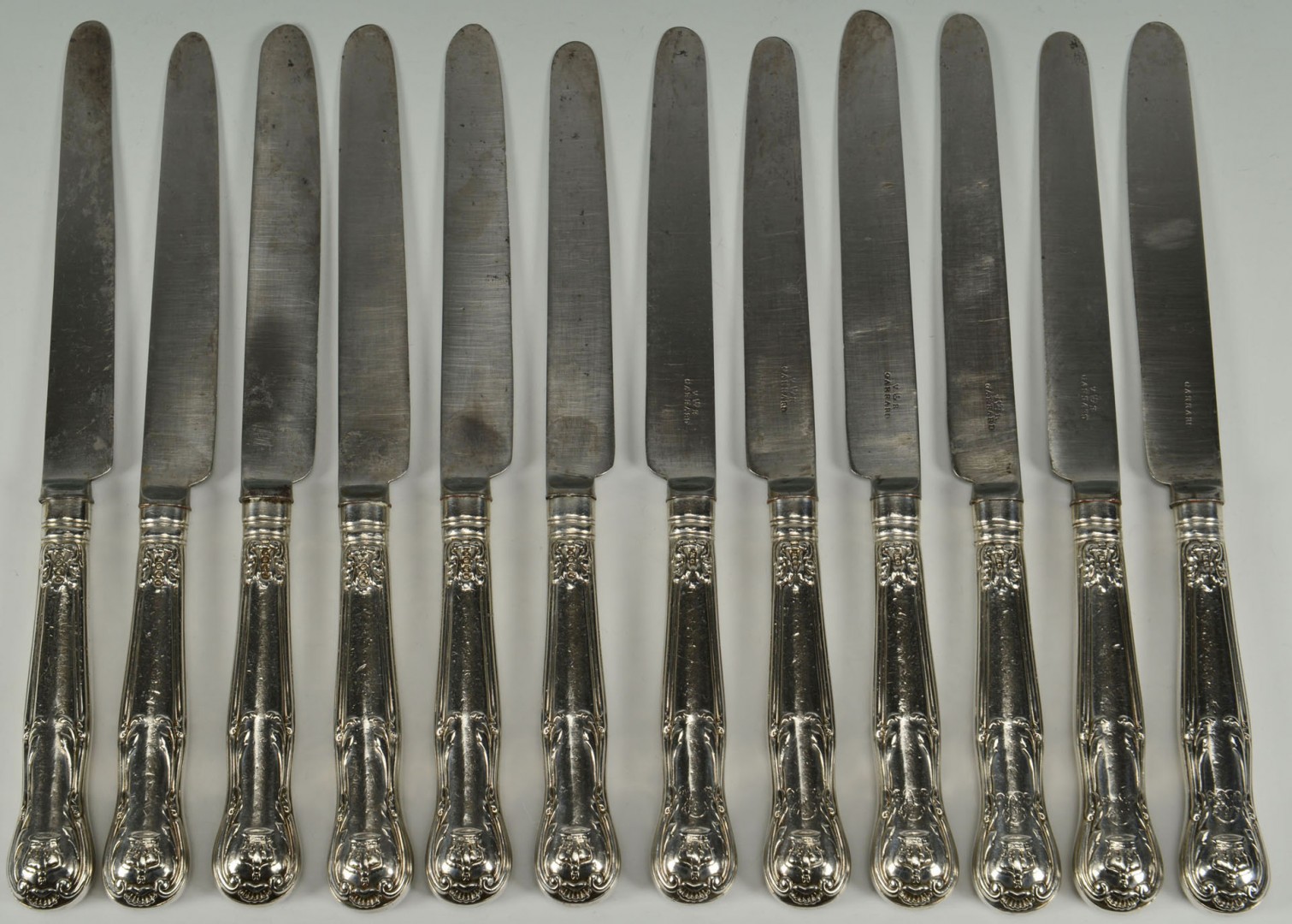 Lot 94: 12 sterling knives by Mary Chawner for Queen Adela