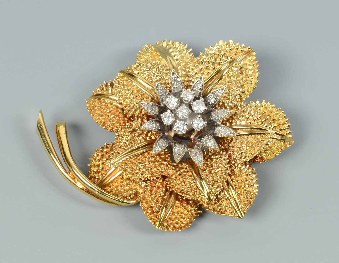 Lot 3088063: 14k Flower pendant/brooch w/ diamonds