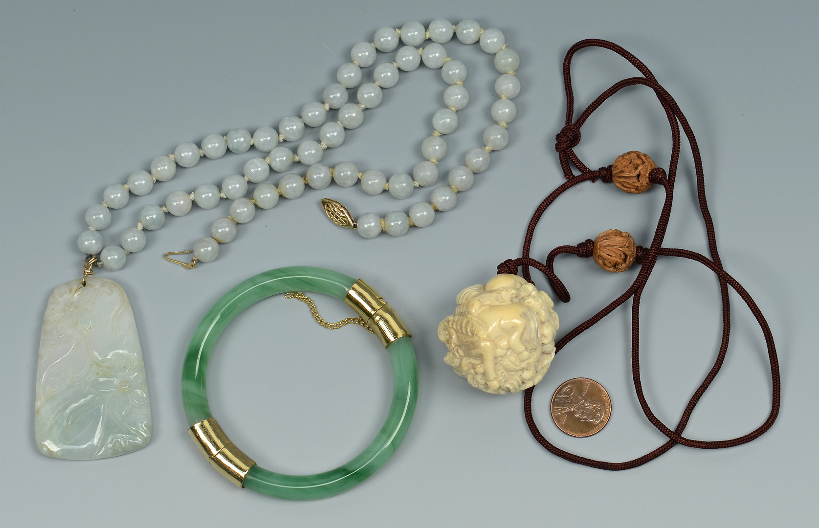 Lot 19: Group of Jade Jewelry & Other