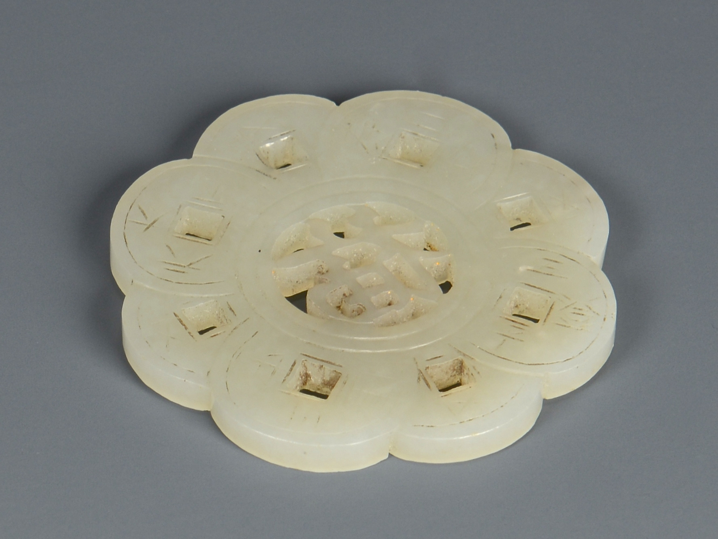 Lot 20: Carved White Jade Disc and Stand