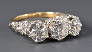 Lot 264: 3-stone OMC Diamond Ring
