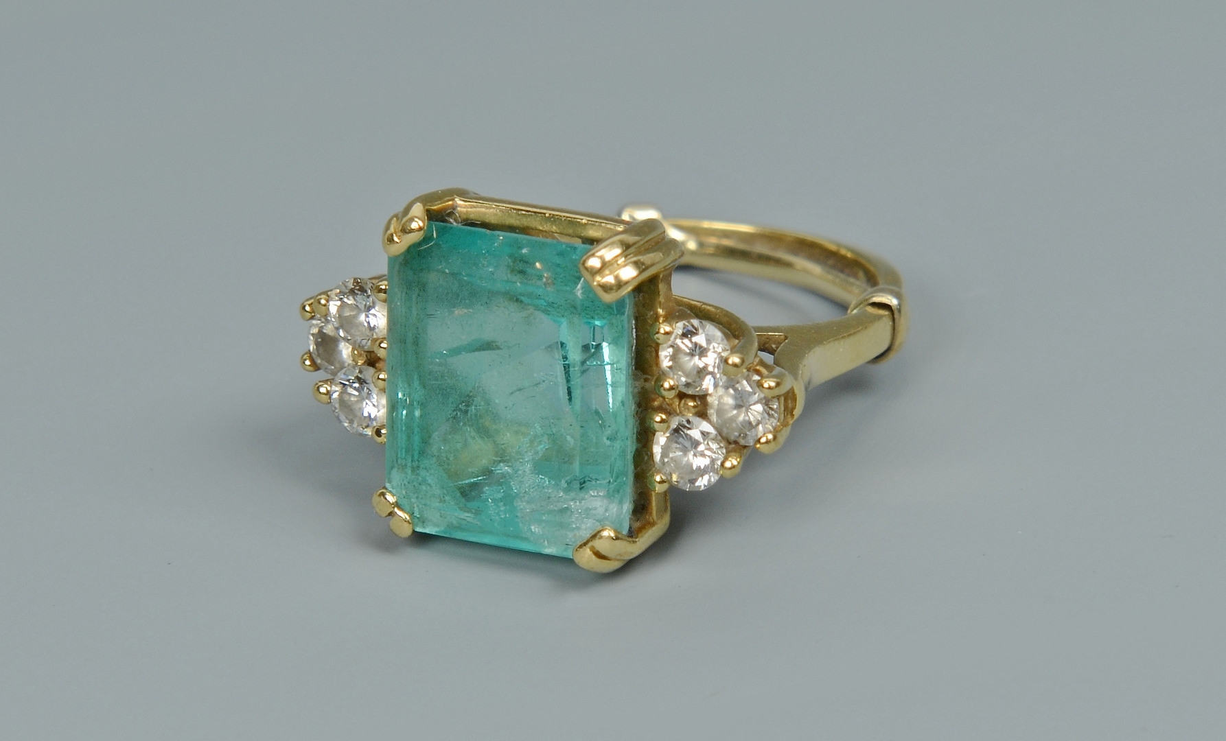 Lot 265: 18K Emerald & Diamond Ring