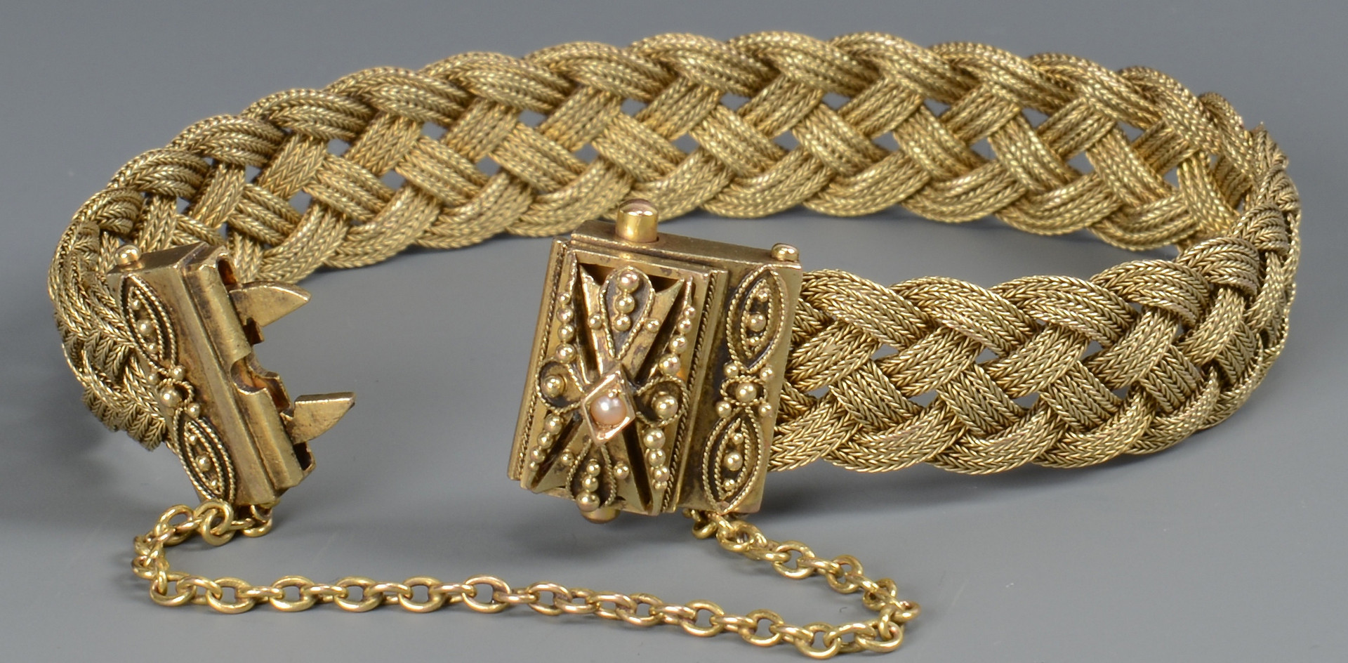 Lot 274: 14K vintage woven bracelet