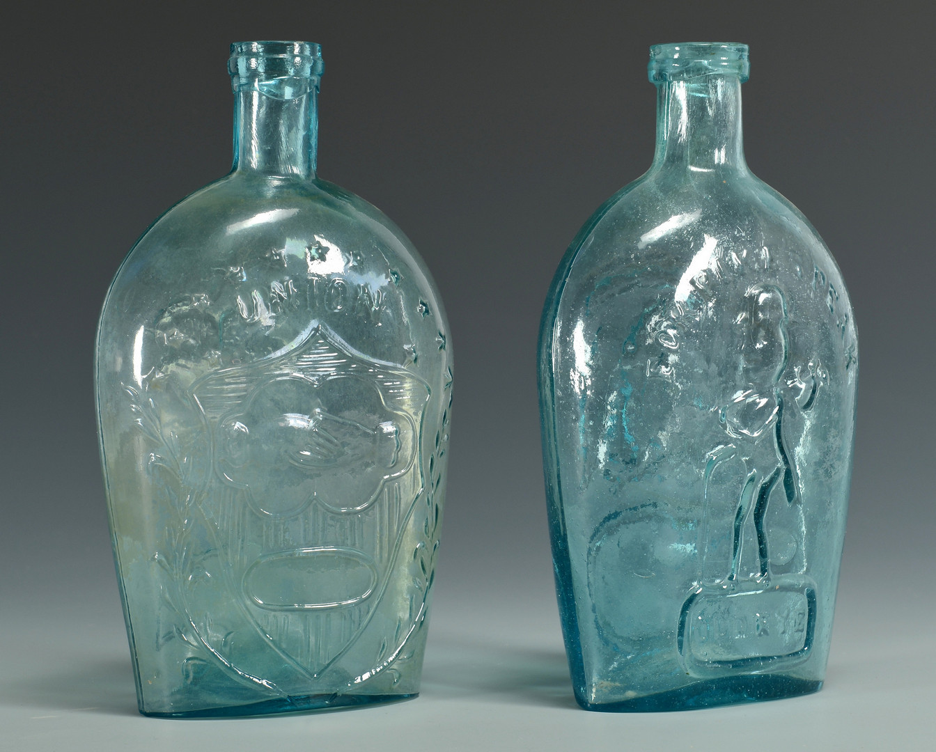 Lot 354: 19th C. Butter Molds and Flasks
