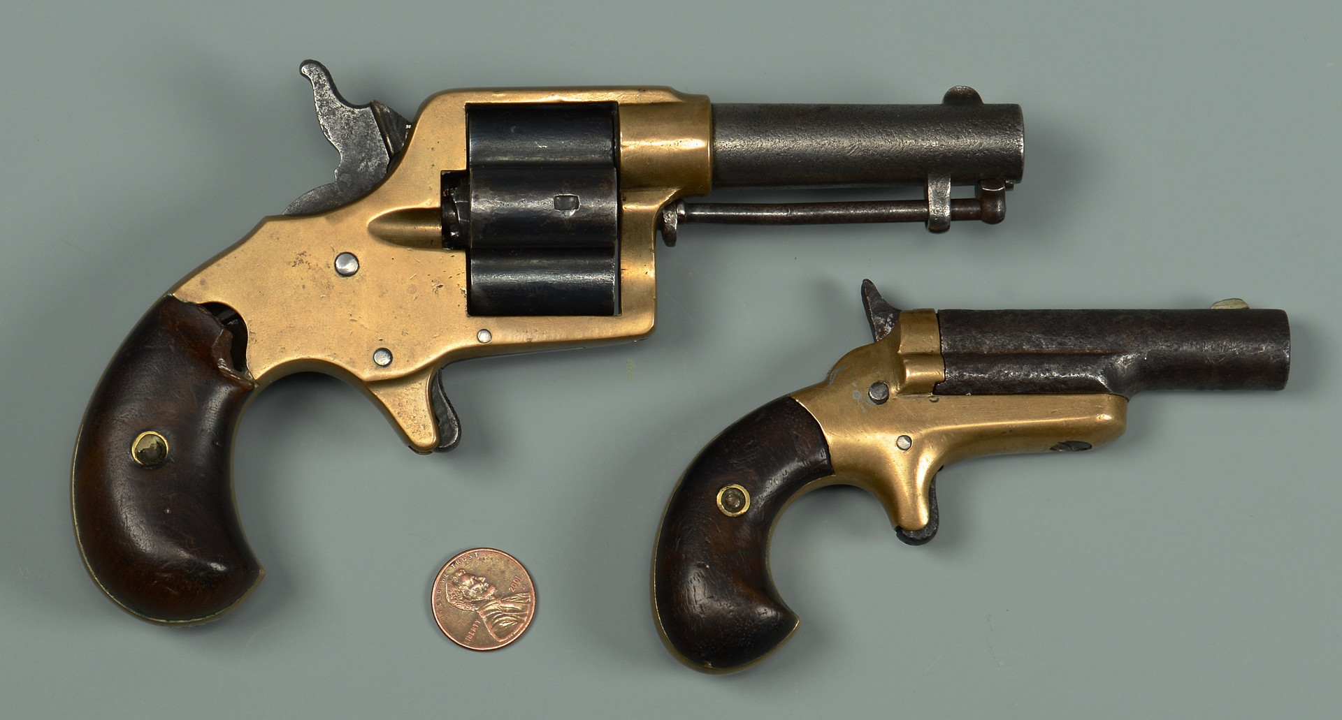Lot 392: Colt Cloverleaf and 3rd Model Deringer, 2 items