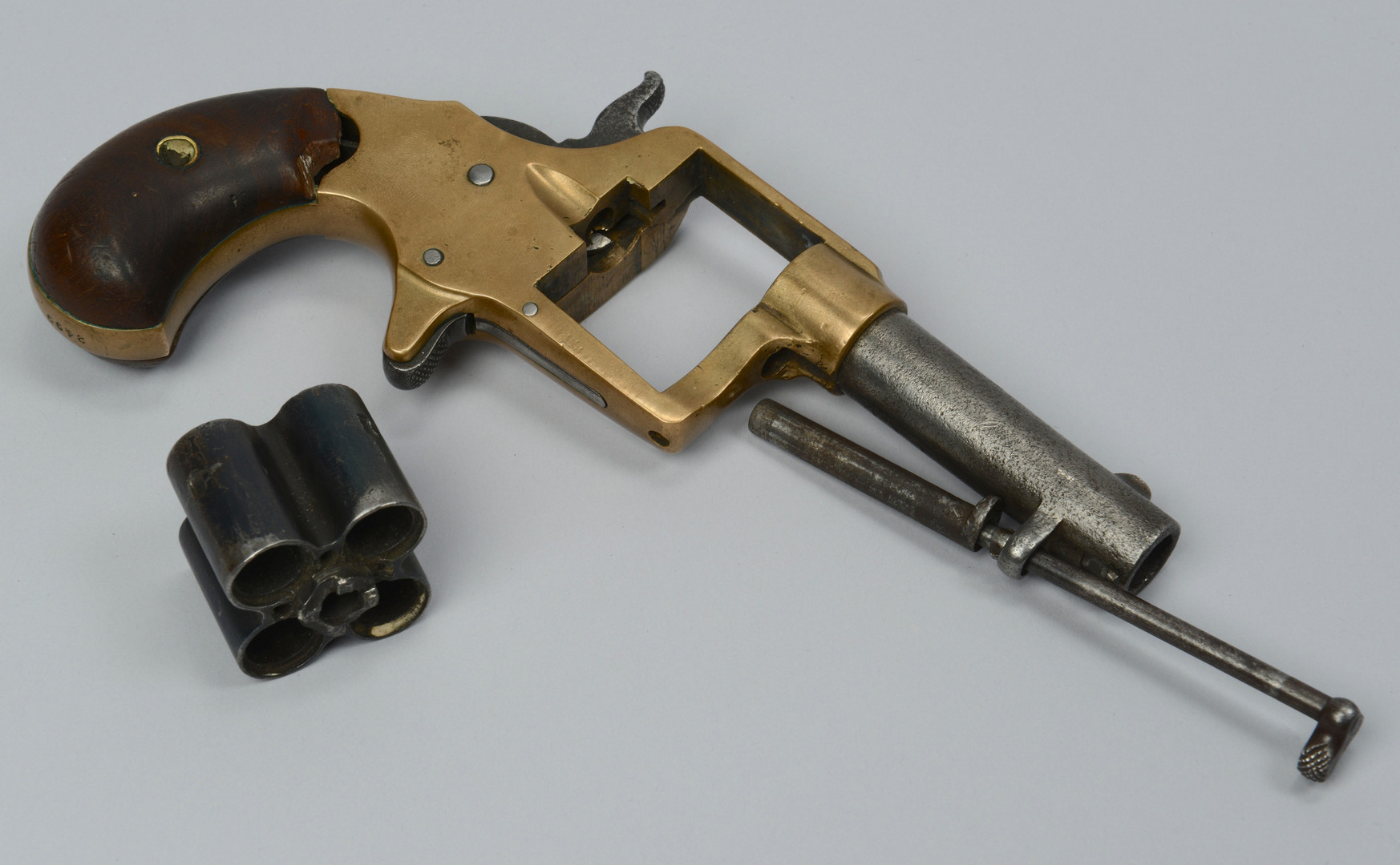 Lot 392: Colt Cloverleaf and 3rd Model Deringer, 2 items