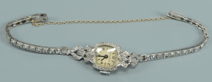Lot 585: Bulova Diamond/Platinum Watch