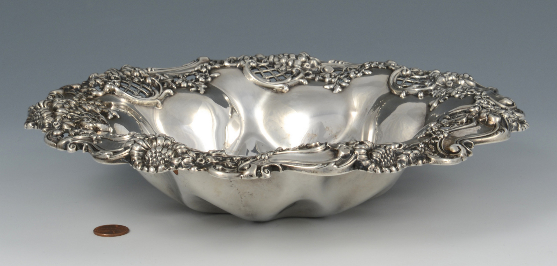 Lot 613: Sterling repousse bowl, Dominick & Haff
