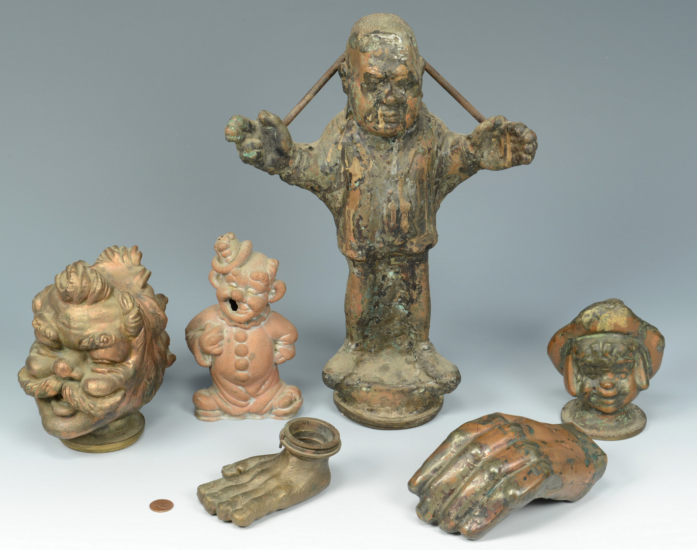 Lot 637: 6 Copper Puppet Molds, People
