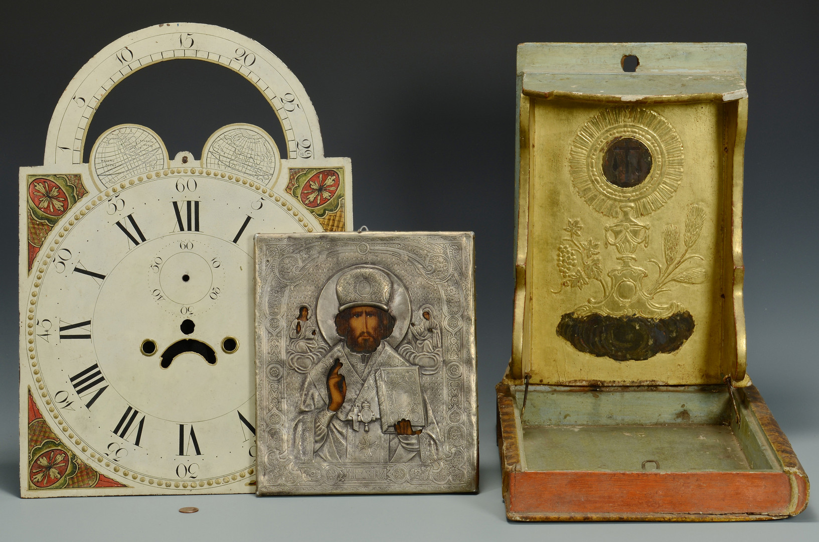 Lot 702: Religious Objects and Clock Face