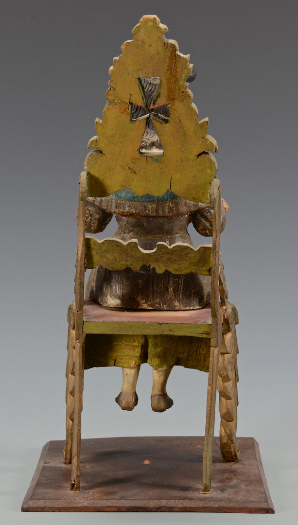Lot 703: Carved Polychrome Santos on Chair