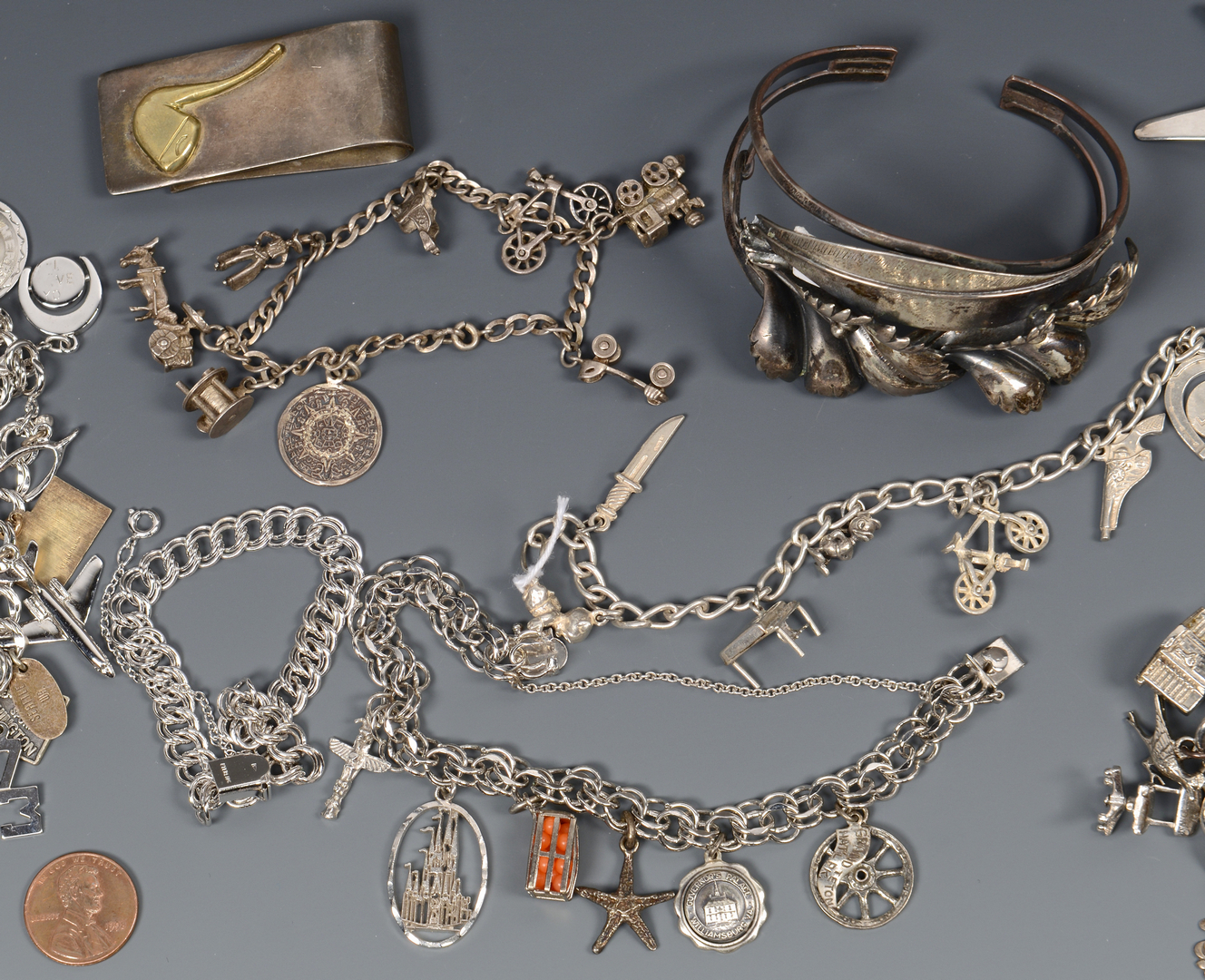 Lot 817: Sterling Charm Bracelets & Novelty Pins