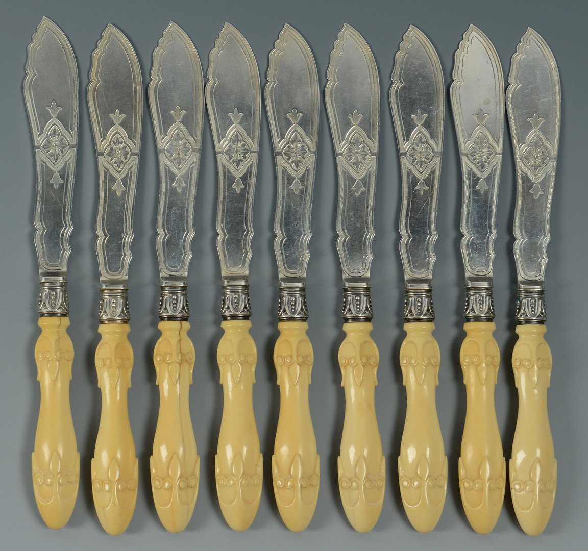 Lot 843: 9 English fish knives