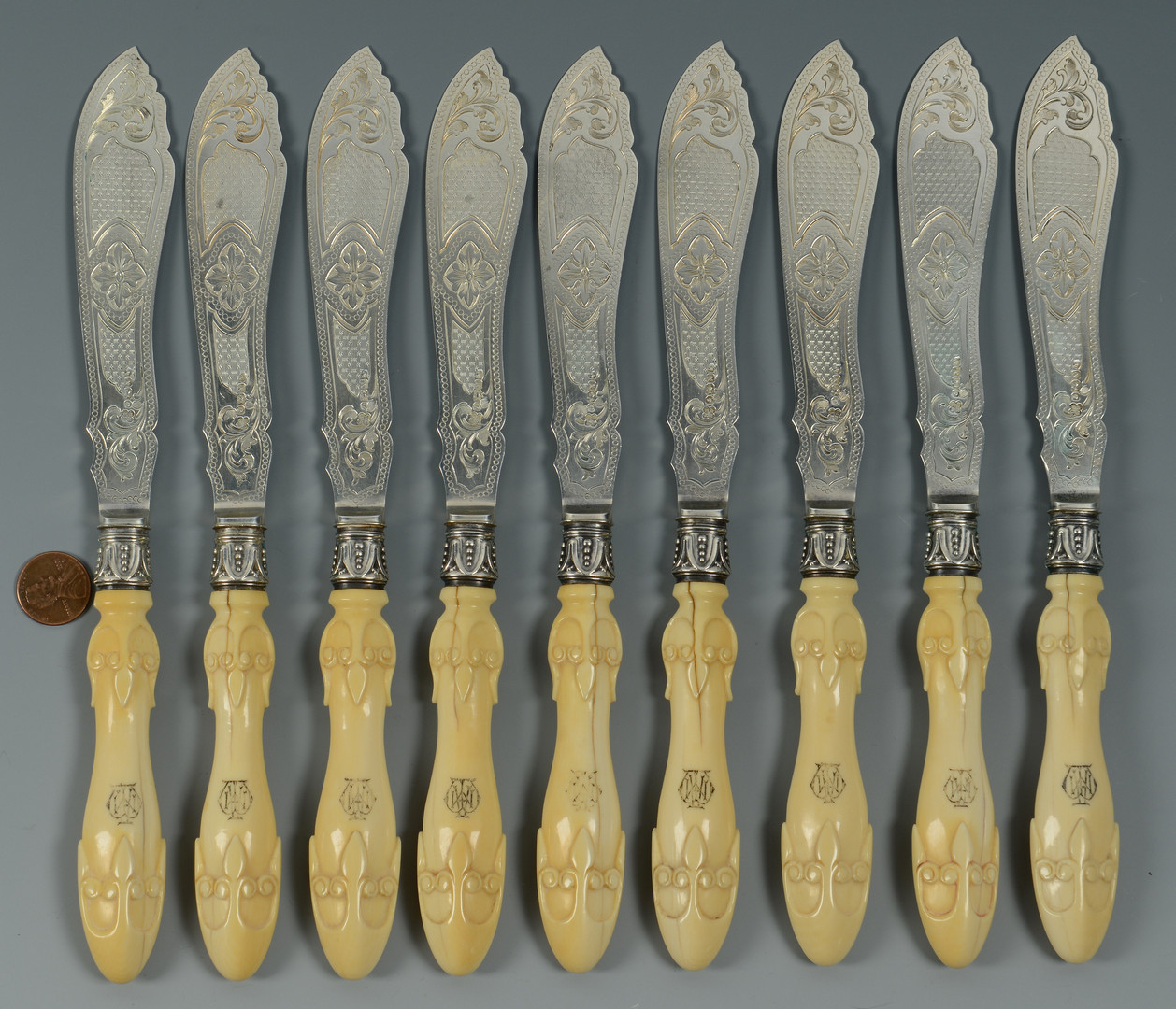 Lot 843: 9 English fish knives