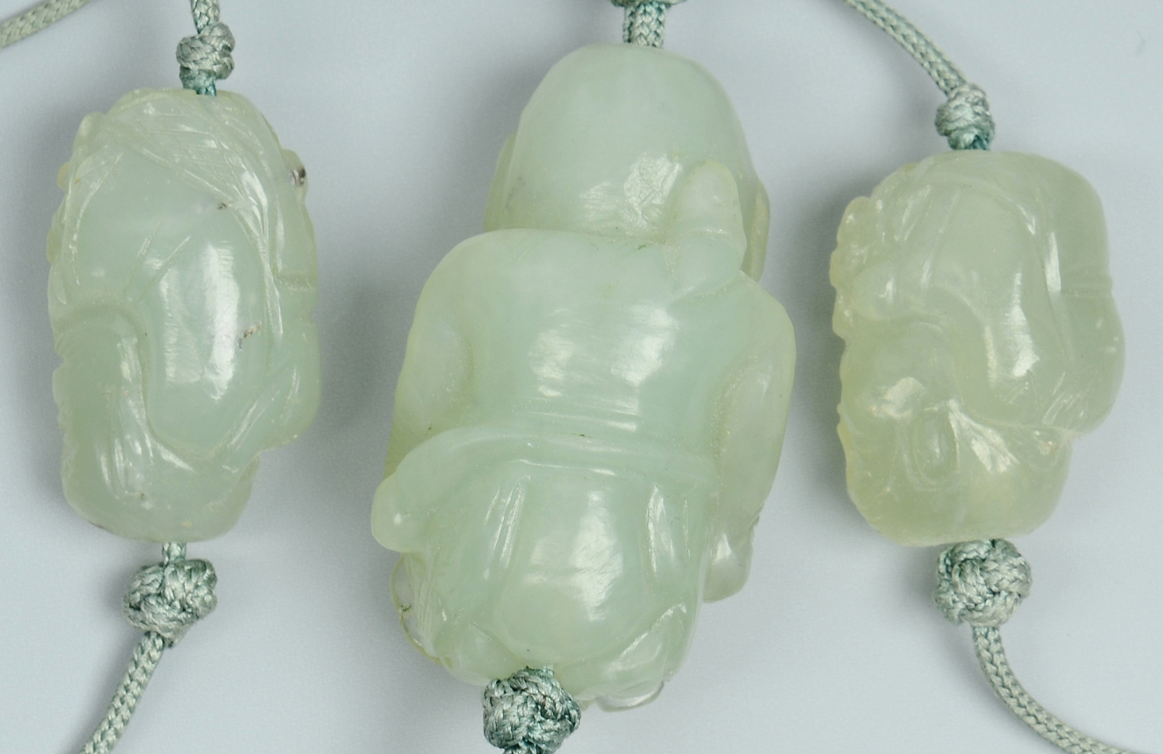Lot 11: Jade pendant, figural necklace, 2 carvings