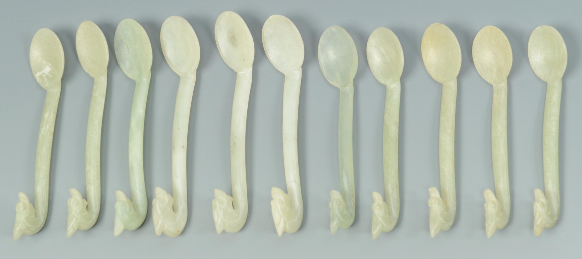 Lot 16: 12 Dragon Carved Hardstone Spoons, Cups and Saucer