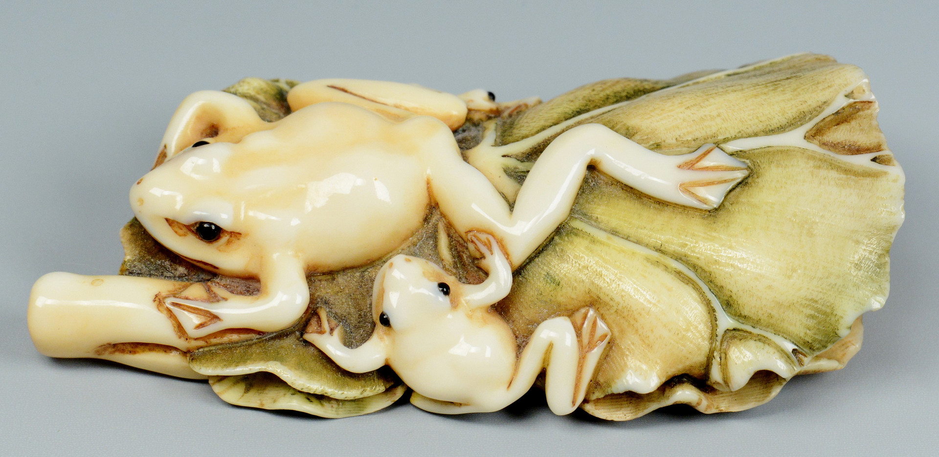 Lot 22: Japanese Ivory Netsuke, Frogs on lily pad