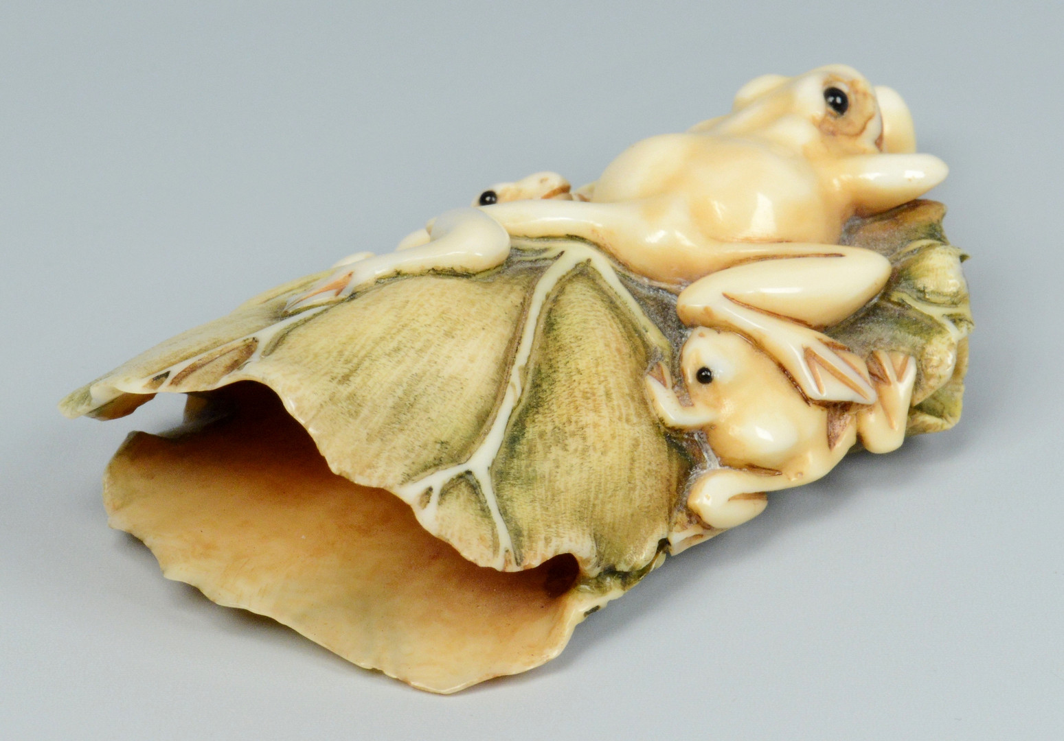Lot 22: Japanese Ivory Netsuke, Frogs on lily pad