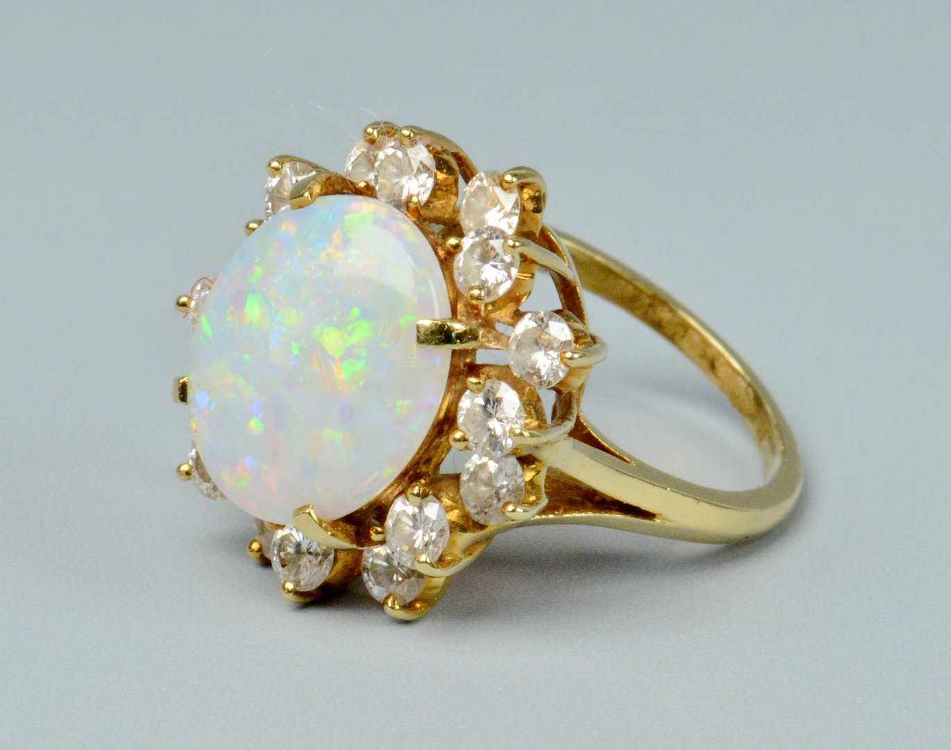 Lot 258: 18k Opal and Diamond Ring