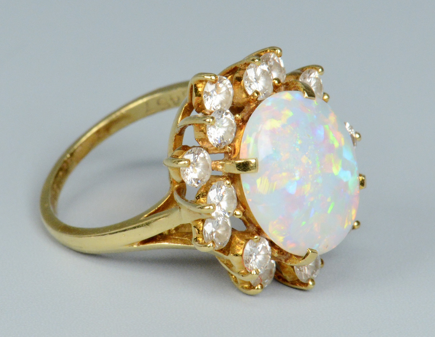 Lot 258: 18k Opal and Diamond Ring