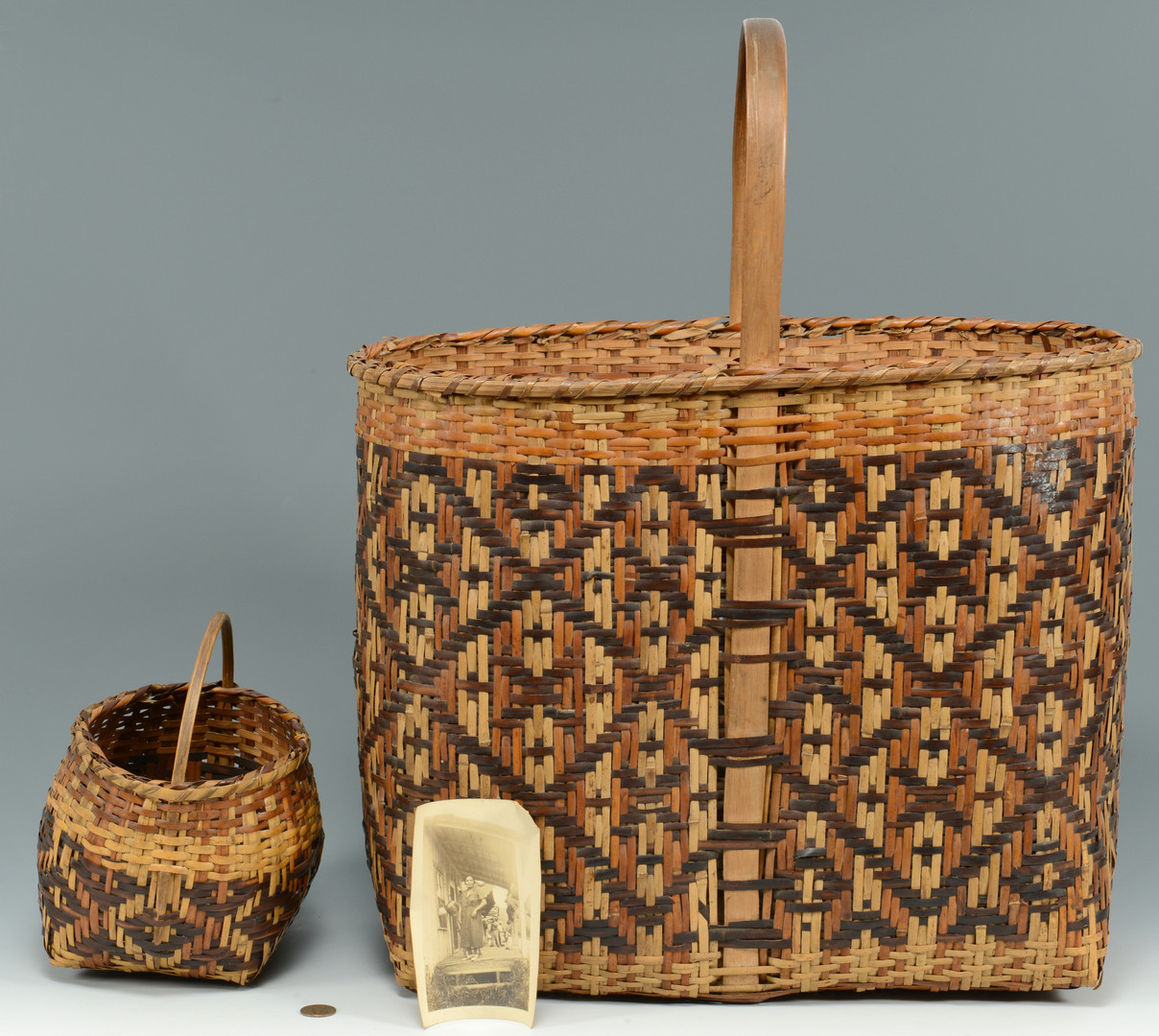 Lot 338: Early Cherokee River Cane baskets, 1937 photo