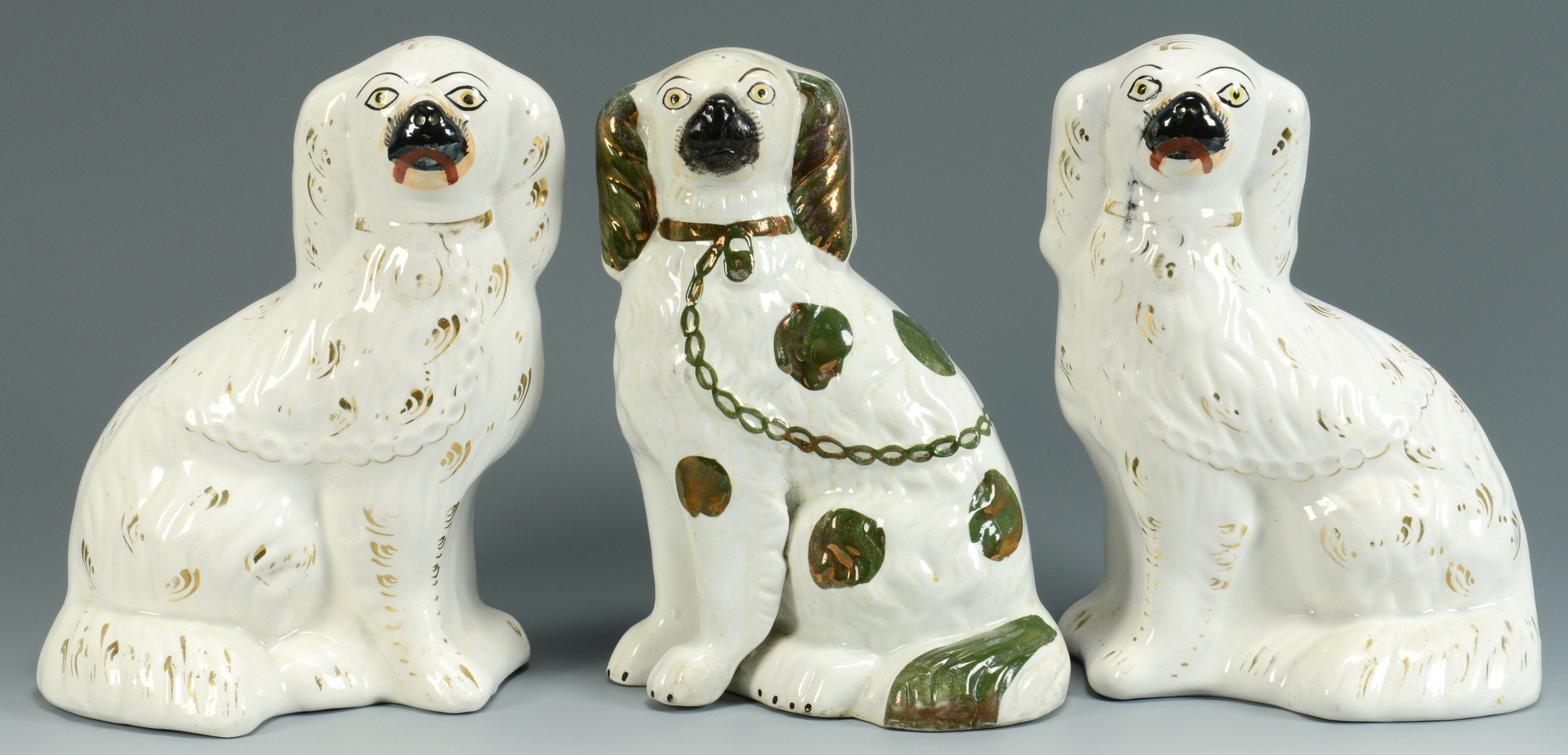 Lot 757: 3 Staffordshire Dogs and 1 Watch Holder