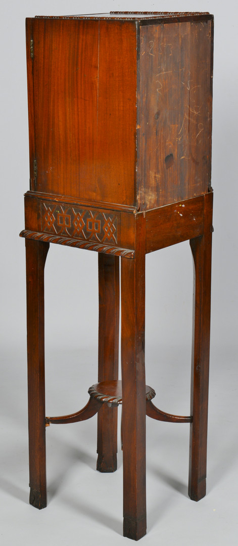 Lot 827: Chippendale style Cabinet on Stand
