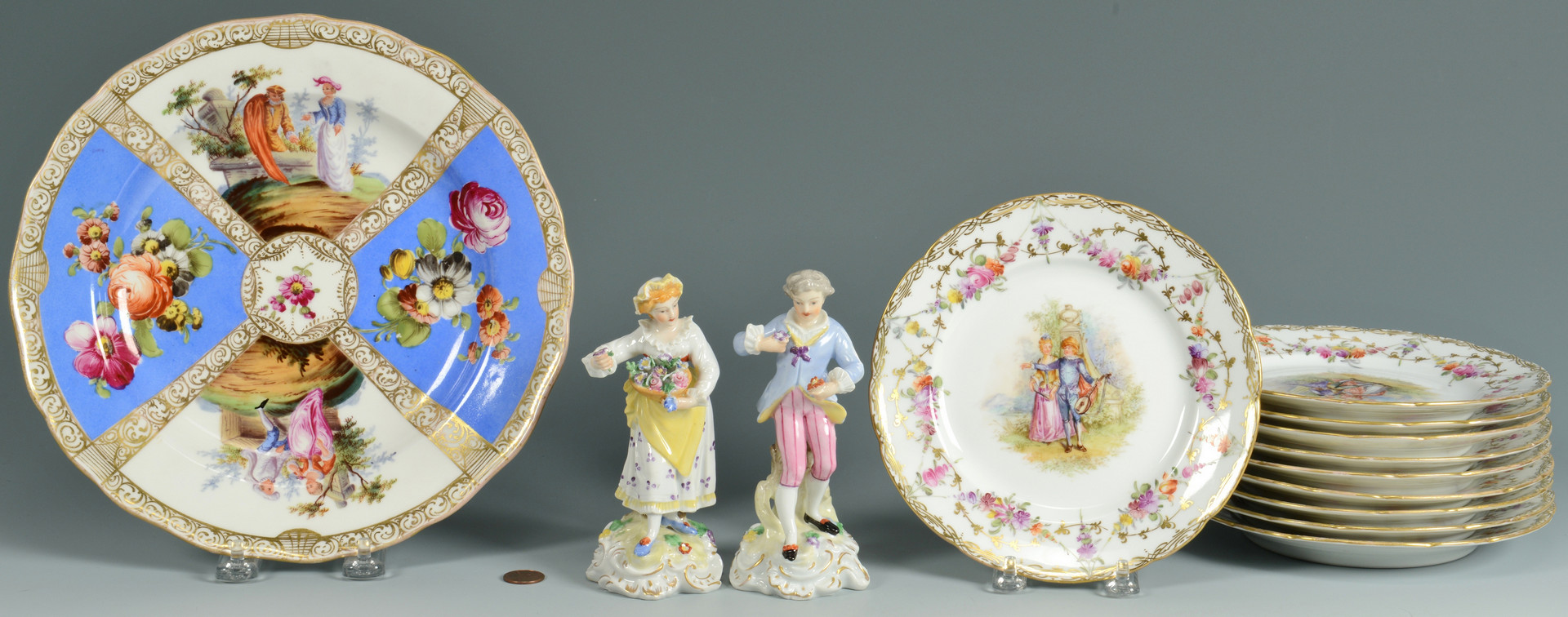 Lot 890: Pair European style Figurines & Plates