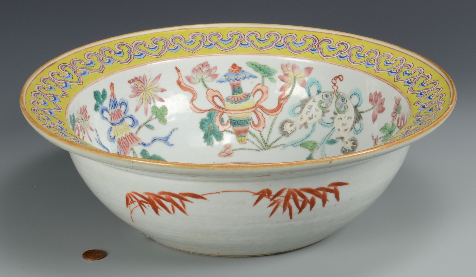 Lot 29: Large Qing Bowl with butterflies, yellow rim
