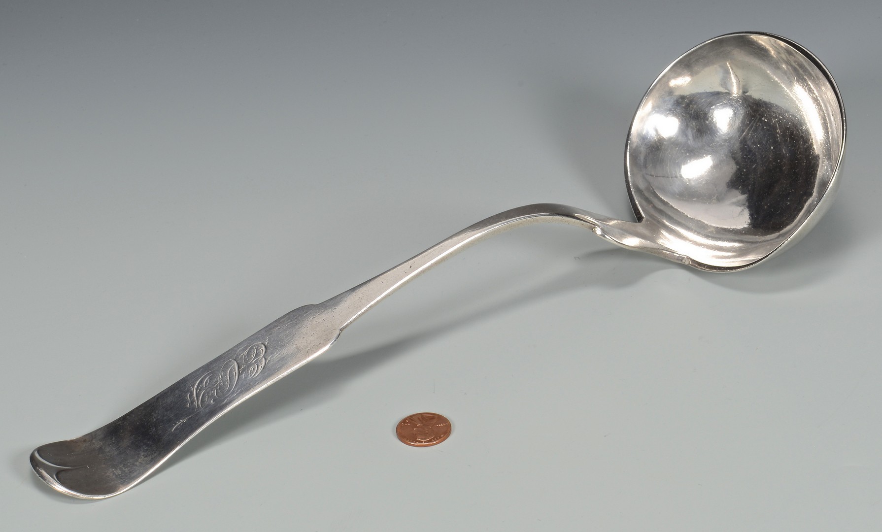 Lot 412: Guelberth MO Coin Silver Soup Ladle