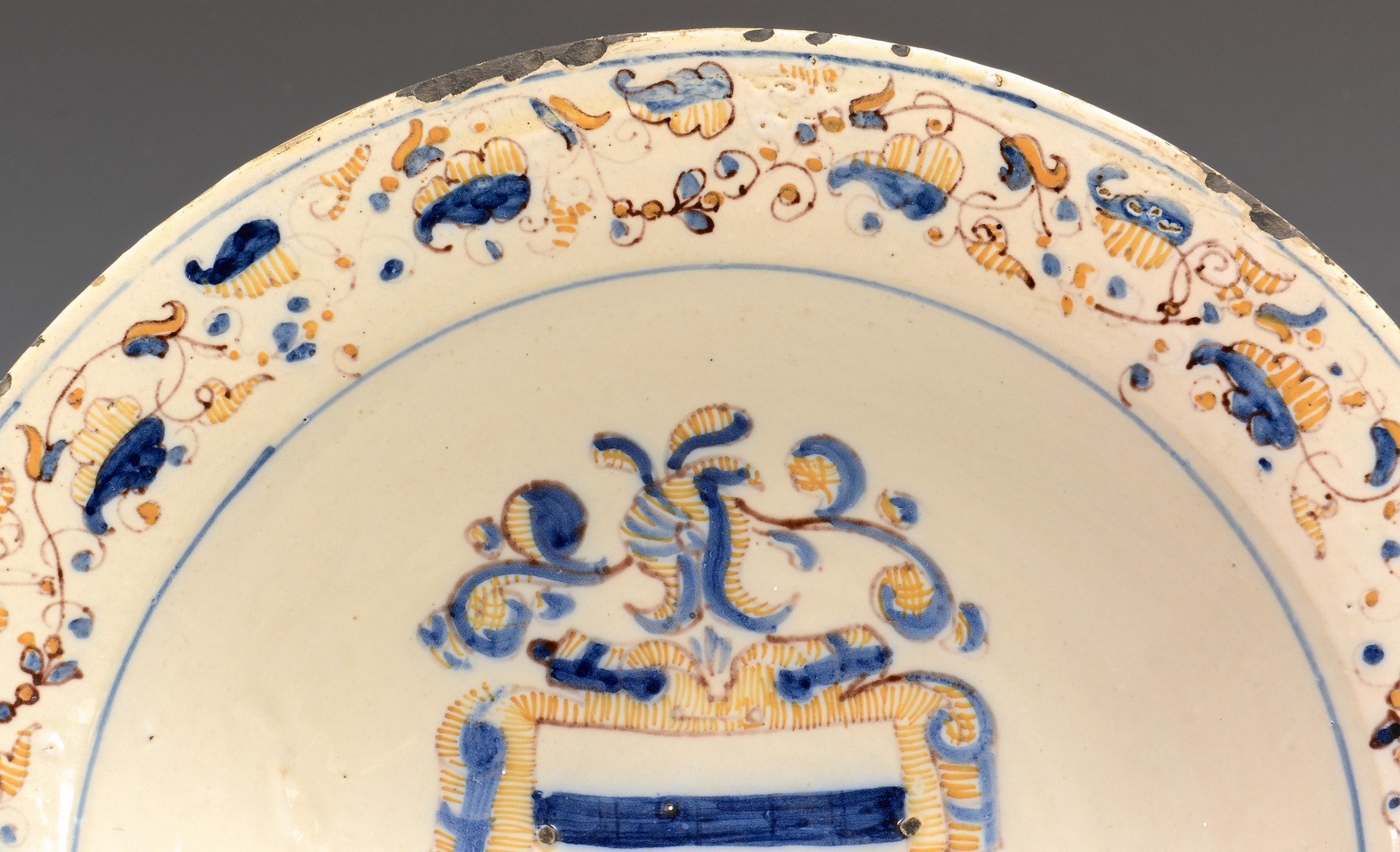 Lot 473: Continental Armorial Faience Bowl