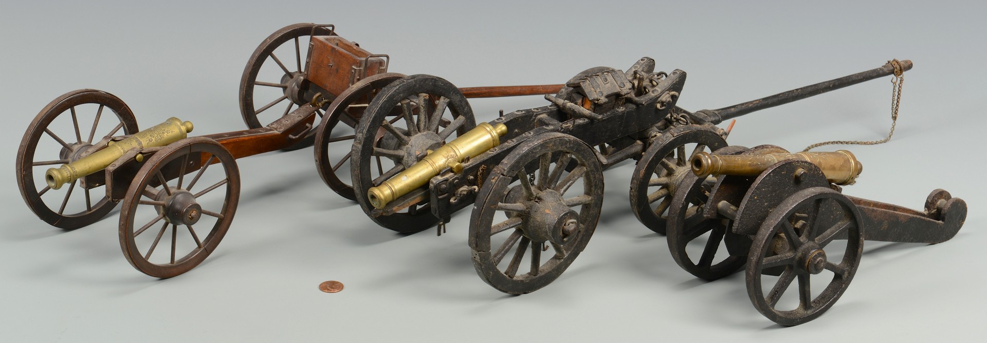Lot 580: 3 Miniature Cannons w/ Caisson & Other
