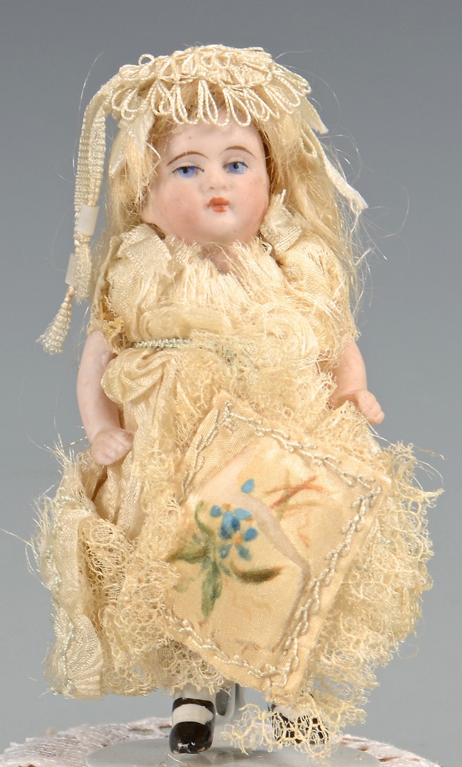 Lot 587: Miniature German Bisque Doll
