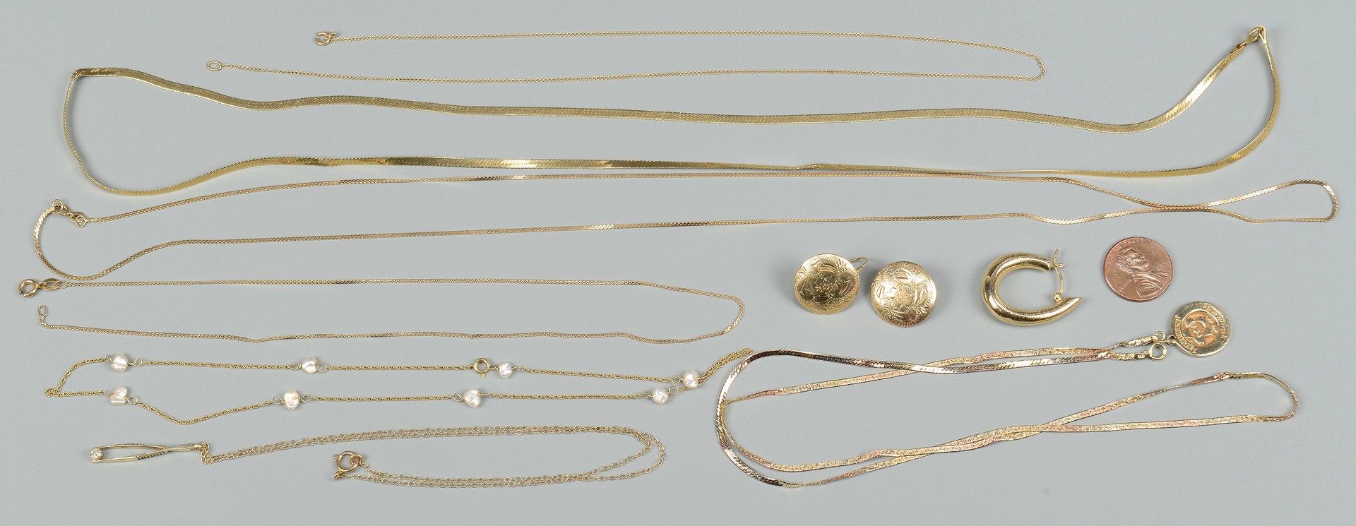 Lot 657: Group of 14K Jewelry