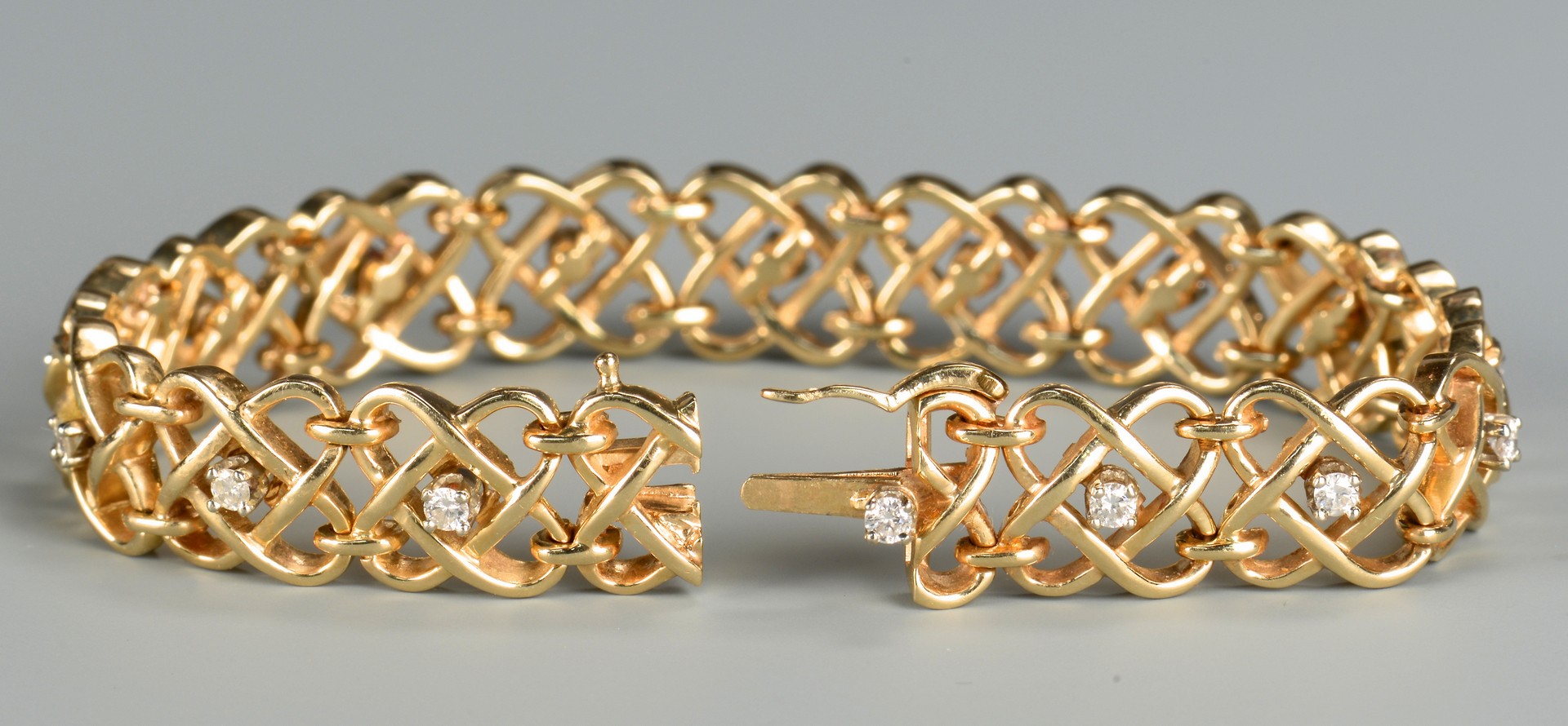 Lot 658: 14k Diamond Woven Bracelet