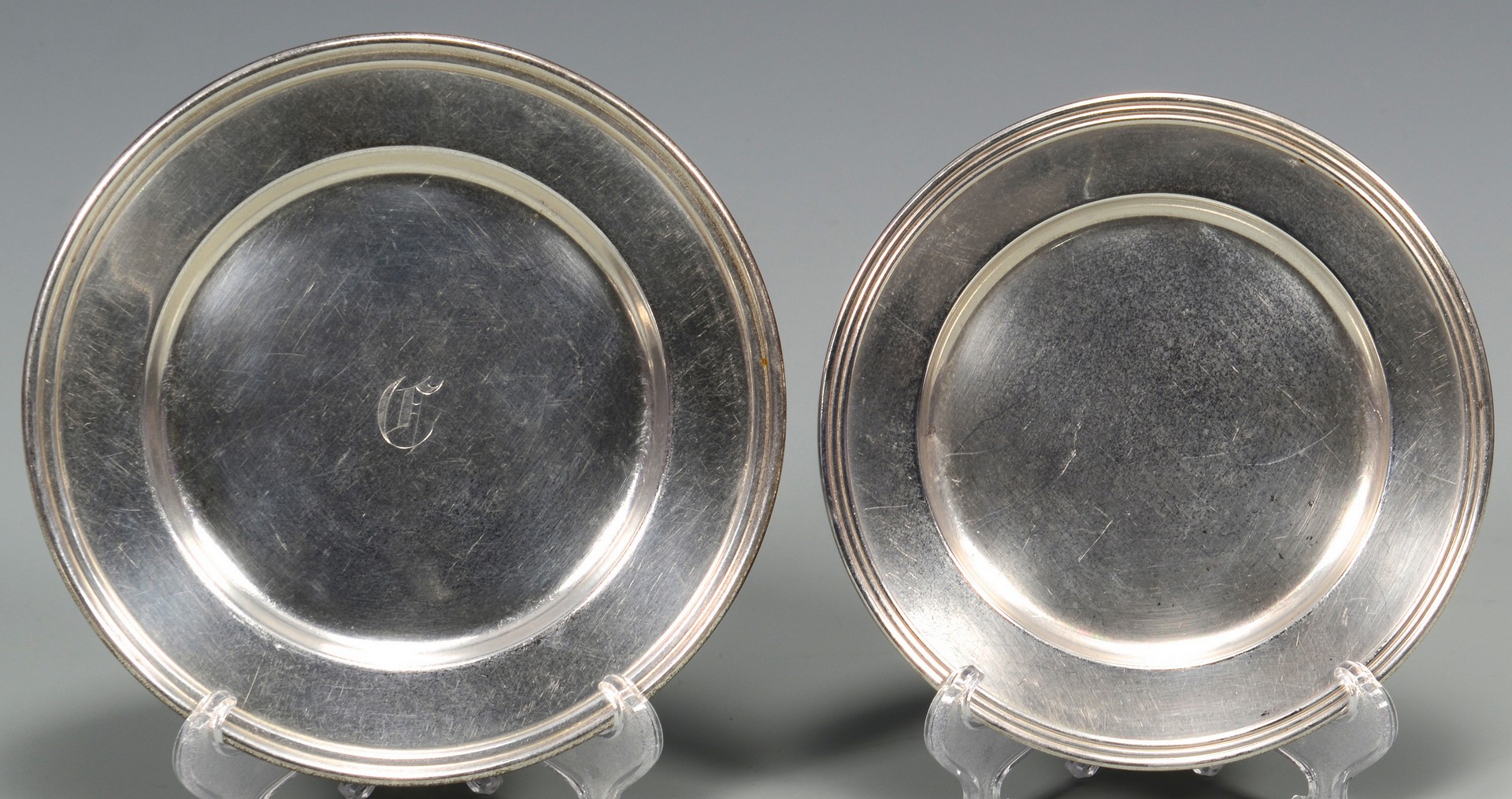 Lot 675: 14 Sterling Bread & Butter Plates