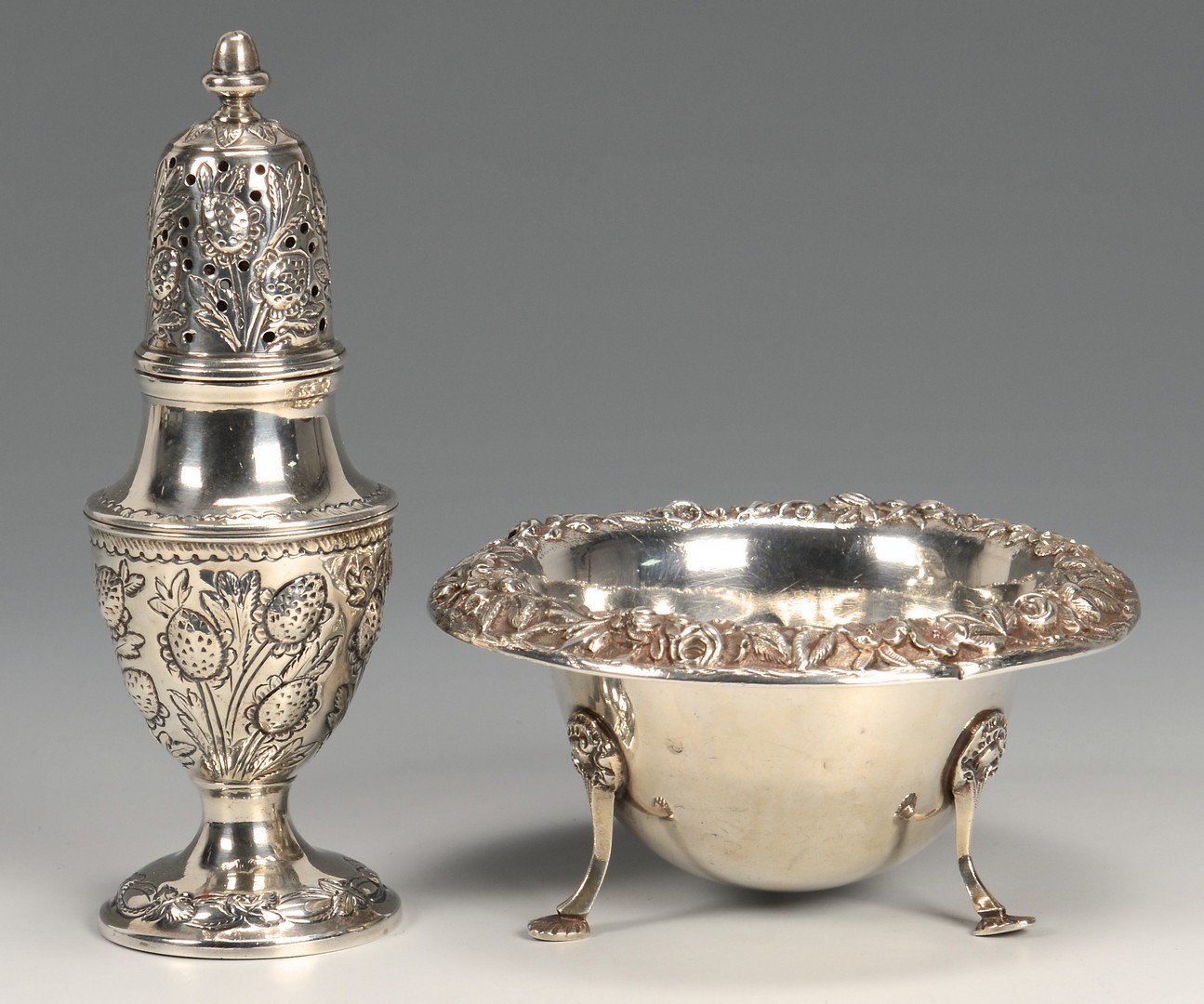 Lot 677: Silver Napoleon spoon, caster and candy dish